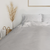 SleepFROG white fitted sheet on bed -neutral room background